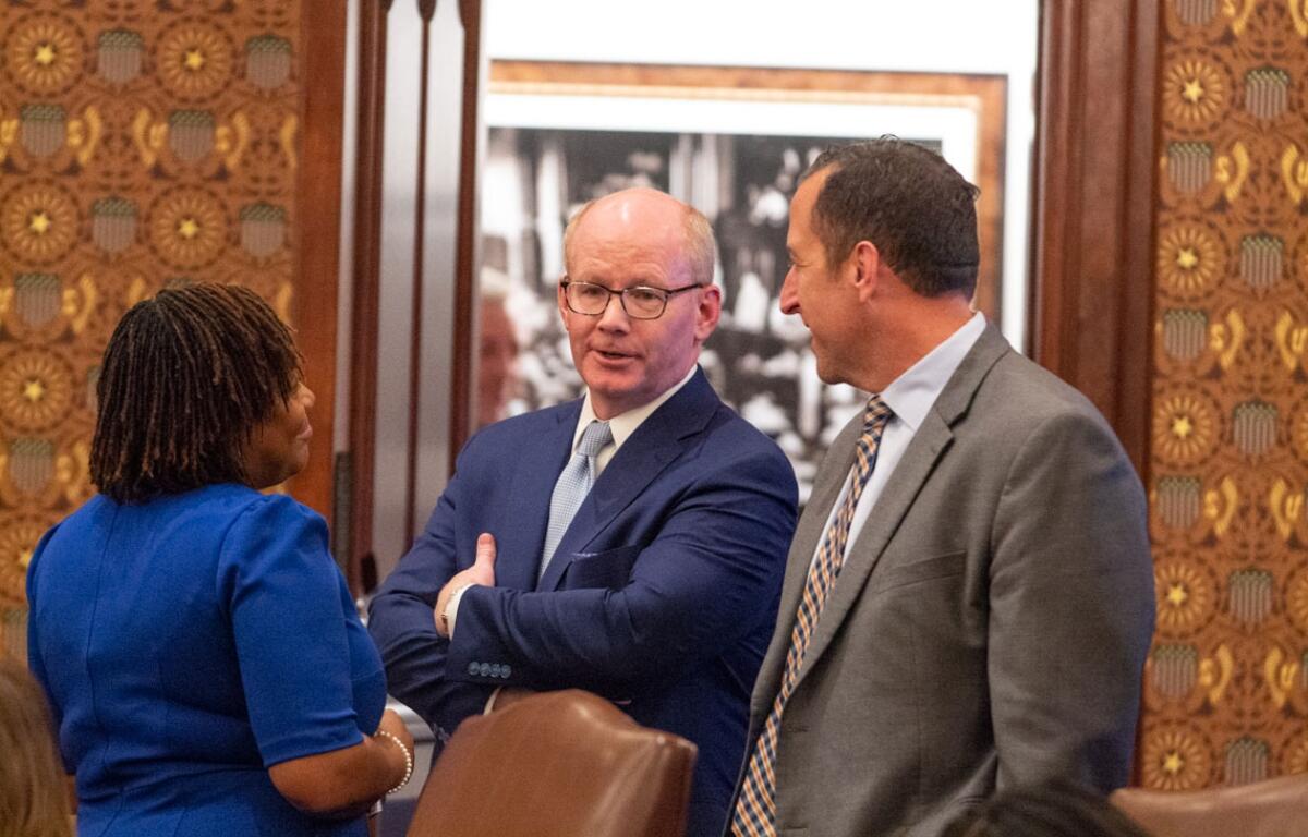 Senate President Don Harmon talks to state Sen. Michael Hastings on the floor of the Illinois Senate on Thursday, Oct. 30, 2025. (Capitol News Illinois photo by Jerry Nowicki)