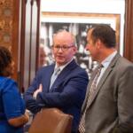 Senate President Don Harmon talks to state Sen. Michael Hastings on the floor of the Illinois Senate on Thursday, Oct. 30, 2025. (Capitol News Illinois photo by Jerry Nowicki)