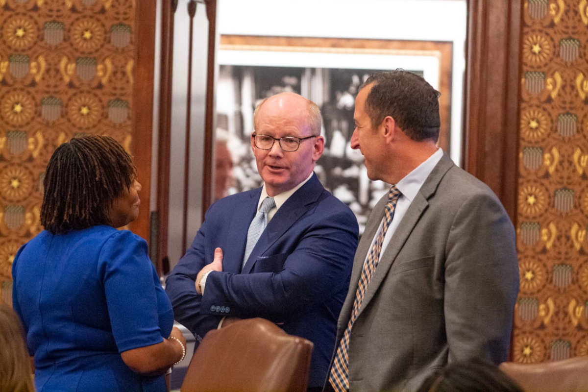 Senate President Don Harmon talks to state Sen. Michael Hastings on the floor of the Illinois Senate on Thursday, Oct. 30, 2025. (Capitol News Illinois photo by Jerry Nowicki)