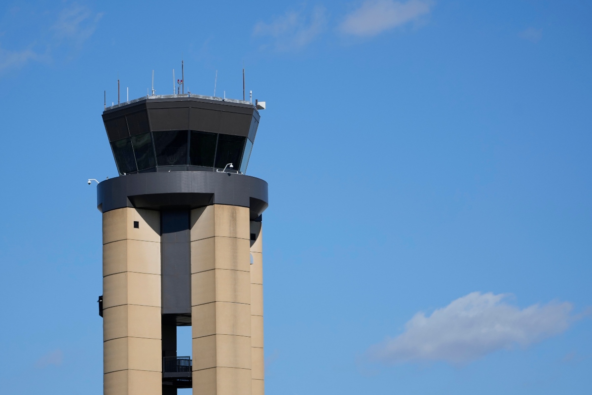 The control tower at Nashville International Airport stands Friday, Oct. 31, 2025, in Nashville, Tenn. (AP Photo/George Walker IV)
