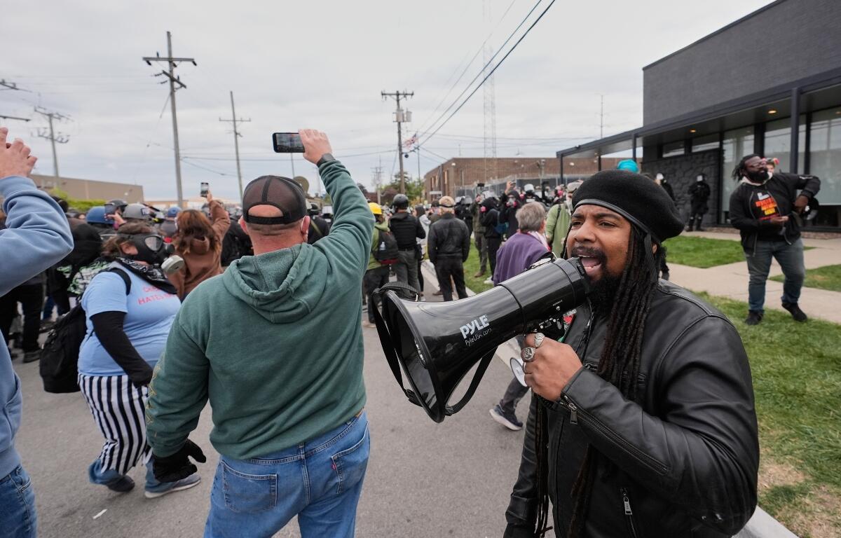 Protesters gather outside an ICE processing facility in the Chicago suburb of Broadview, Ill., Saturday, Nov. 1, 2025. (AP Photo/Alex Brandon)