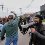 Protesters gather outside an ICE processing facility in the Chicago suburb of Broadview, Ill., Saturday, Nov. 1, 2025. (AP Photo/Alex Brandon)