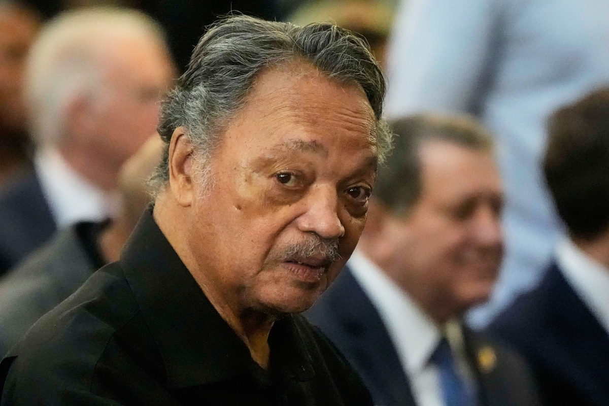 FILE - The Rev. Jesse Jackson listens to speakers at the Tabernacle Baptist Church during the 60th anniversary of the march to ensure that African Americans could exercise their constitutional right to vote, March 9, 2025, in Selma, Ala. (AP Photo/Mike Stewart, File)