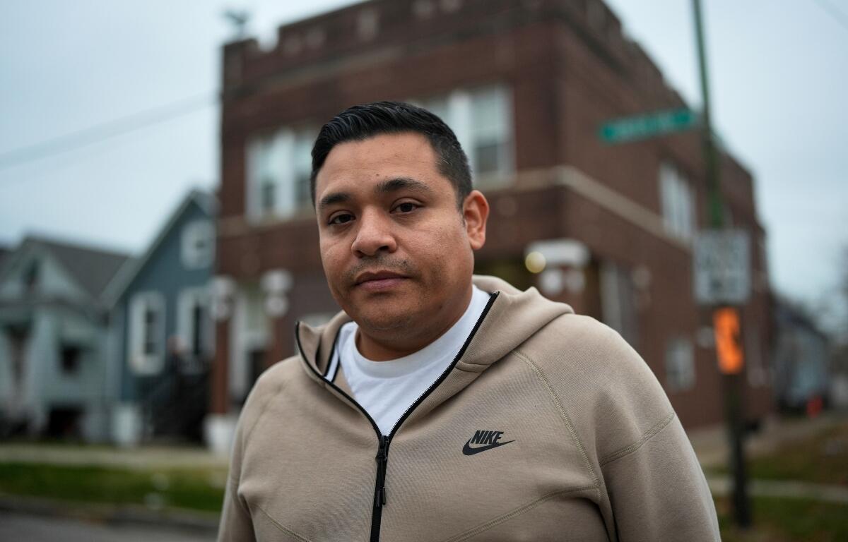 Jose Aguilar, who recorded cell phone video of federal agents chasing and tackling a Black teen in the East Side neighborhood in October, stands outside his family's business Tuesday, Nov. 18, 2025, in Chicago. (AP Photo/Erin Hooley)