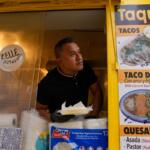 Rafael Hernandez, originally from Mexico, sells food from his family's food truck, Nov. 6, 2025, in Chicago. (AP Photo/Erin Hooley)