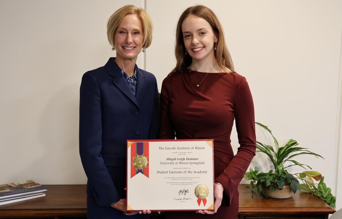 UIS Chancellor Janet Gooch (left) posing with Abigail Hemmer