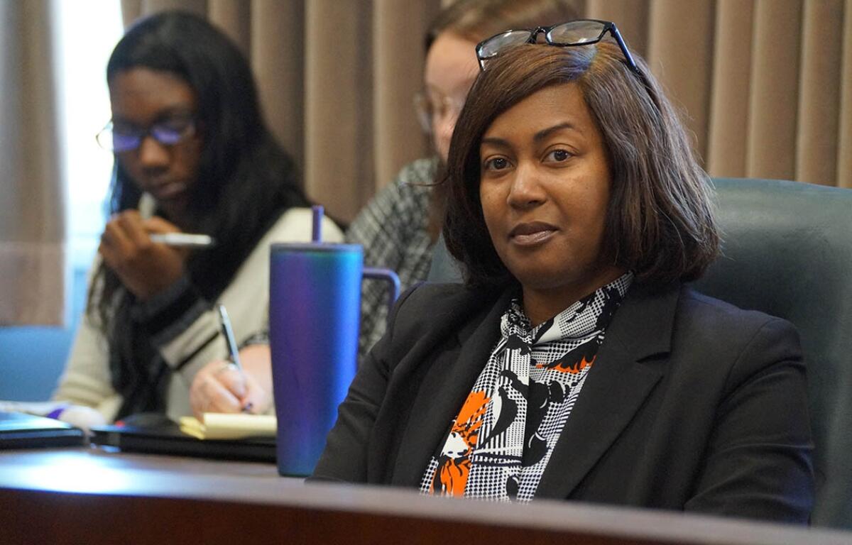 Illinois Department of Corrections Director Latoya Hughes listens during a public hearing Tuesday, Nov. 4, 2025, on a proposed administrative rule allowing the agency to scan inmates’ incoming mail to reduce the flow of drugs and other contraband entering state prisons. (Capitol News Illinois photo by Peter Hancock)