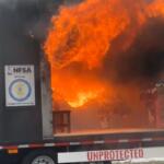 A demonstration trailer shows how quickly a fire can flare up in a home -- in this case, due to a candle being near a Christmas tree and presents.