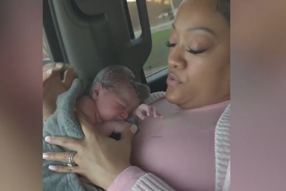 A screenshot of a video taken by the Wells family after Mercedes Wells gave birth to a baby, following being discharged from a hospital.