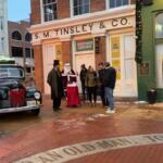 Santa, Abraham Lincoln, and others prepare for a tree lighting ceremony last week at the Old State Capitol Plaza downtown.