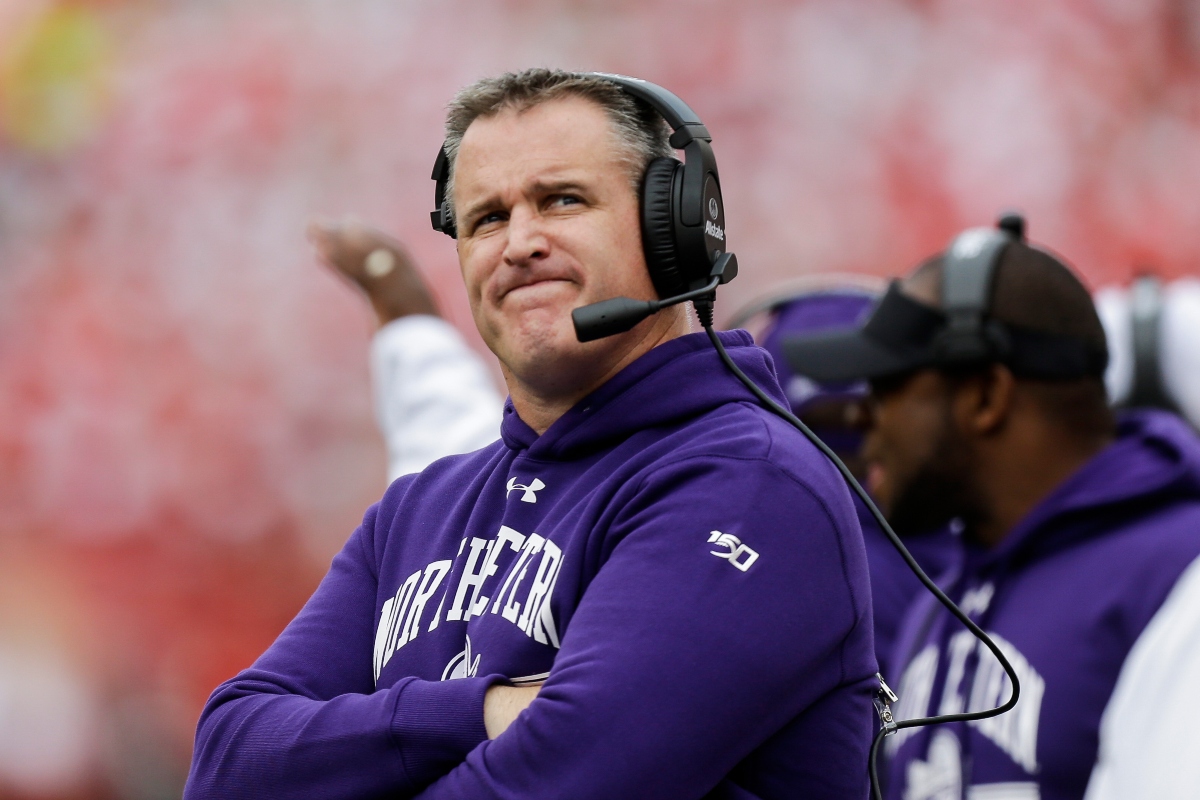 FILE - Northwestern head coach Pat Fitzgerald looks up on the sideline during the first half of an NCAA college football game against Wisconsin Saturday, Sept. 28, 2019, in Madison, Wis. (AP Photo/Andy Manis, File)