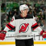 FILE - New Jersey Devils' Cal Foote waits on a face off during an NHL hockey game against the Dallas Stars in Dallas, March 14, 2024. (AP Photo/Tony Gutierrez, File)