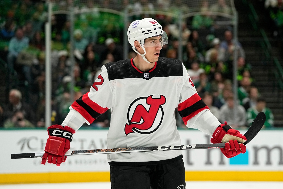 FILE - New Jersey Devils' Cal Foote waits on a face off during an NHL hockey game against the Dallas Stars in Dallas, March 14, 2024. (AP Photo/Tony Gutierrez, File)