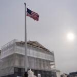 With the Supreme Court Building under renovations, the justices hear oral arguments on President Donald Trump's push to expand control over independent federal agencies, on Capitol Hill in Washington, Monday, Dec. 8, 2025. (AP Photo/J. Scott Applewhite)