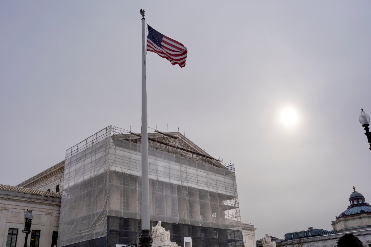 With the Supreme Court Building under renovations, the justices hear oral arguments on President Donald Trump's push to expand control over independent federal agencies, on Capitol Hill in Washington, Monday, Dec. 8, 2025. (AP Photo/J. Scott Applewhite)
