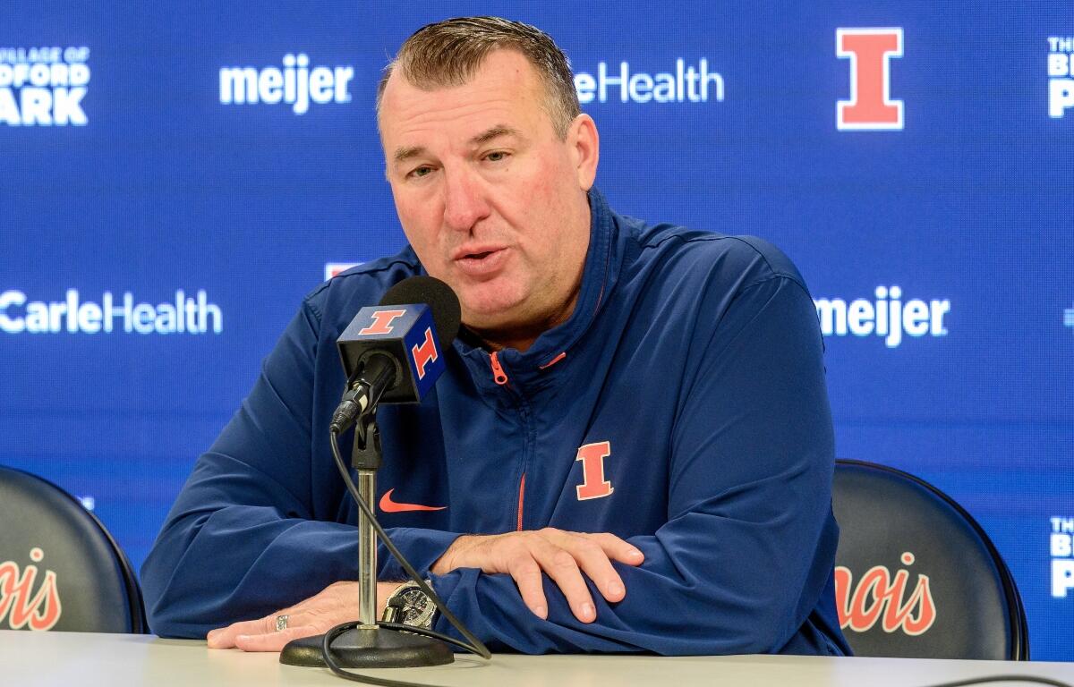Illinois football head coach Brett Bielema talks about Illinois' upcoming appearance in the Liberty Mutual Music City Bowl prior an NCAA college basketball game between Nebraska and Illinois Saturday, Dec. 13, 2025, in Champaign, Ill. (AP Photo/Craig Pessman)