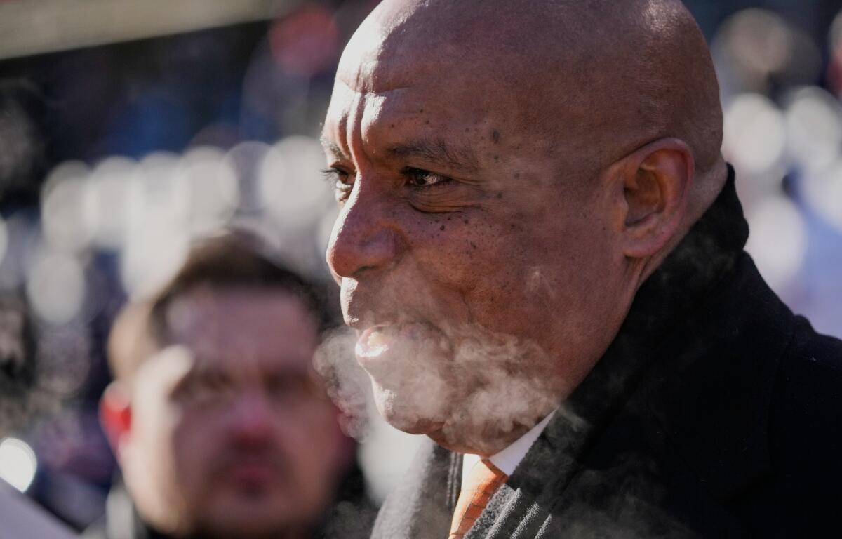 Kevin Warren, president and chief executive officer of the Chicago Bears, talks on the field before an NFL football game against the Cleveland Browns in Chicago, Sunday, Dec. 14, 2025. (AP Photo/Nam Y. Huh)