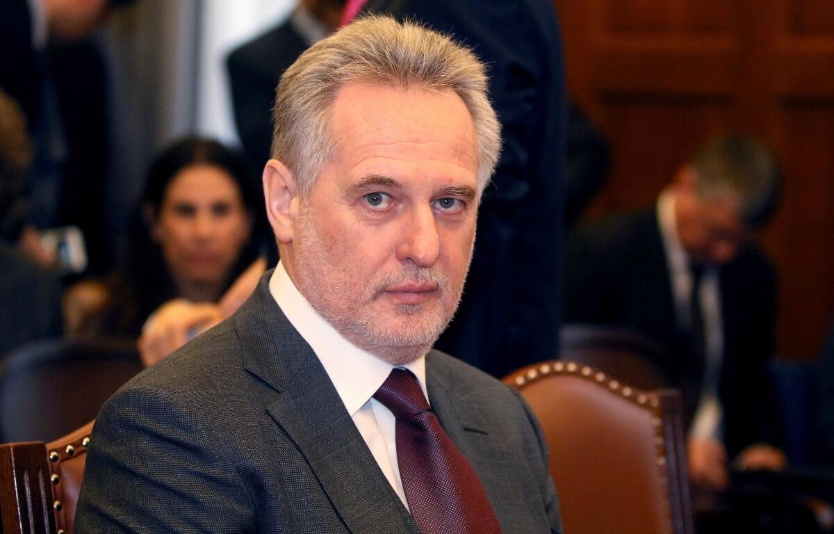 FILE - Ukrainian oligarch Dymitro Firtash waits for the start of his trial at the courts of justice in Vienna, Austria, Feb. 21, 2017. (AP Photo/Ronald Zak, File)