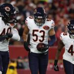 Chicago Bears linebacker T.J. Edwards (53) is congratulated by teammates after returning an interception for a touchdown during the first half of an NFL football game against the San Francisco 49ers in Santa Clara, Calif., Sunday, Dec. 28, 2025. (AP Photo/Jed Jacobsohn)