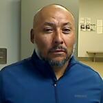 Ismael Ayuzo Sandoval is pictured in an Immigration and Customs Enforcement booking photo.