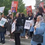Immigrant rights advocates demonstrate outside the Illinois Statehouse in Springfield in May, 2025, urging passage of legislation to guarantee all children the right to a free public education regardless of their immigration or citizenship status. (Capitol News Illinois photo by Peter Hancock)