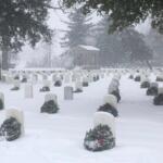 Several hundred wreaths were laid at the gravestones of veterans at Camp Butler National Cemetery Saturday as part of "Wreaths Across America."