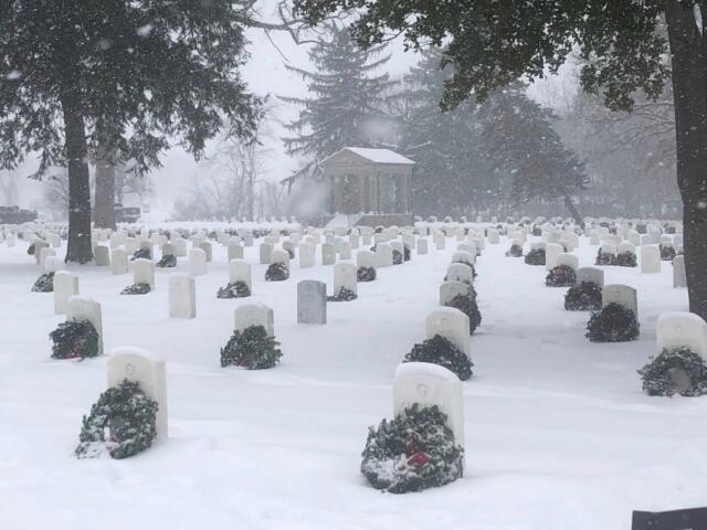 Several hundred wreaths were laid at the gravestones of veterans at Camp Butler National Cemetery Saturday as part of "Wreaths Across America."