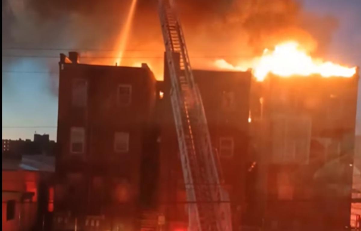 A screenshot of part of a Facebook video from the scene of a fire to a historic building in Jacksonville.