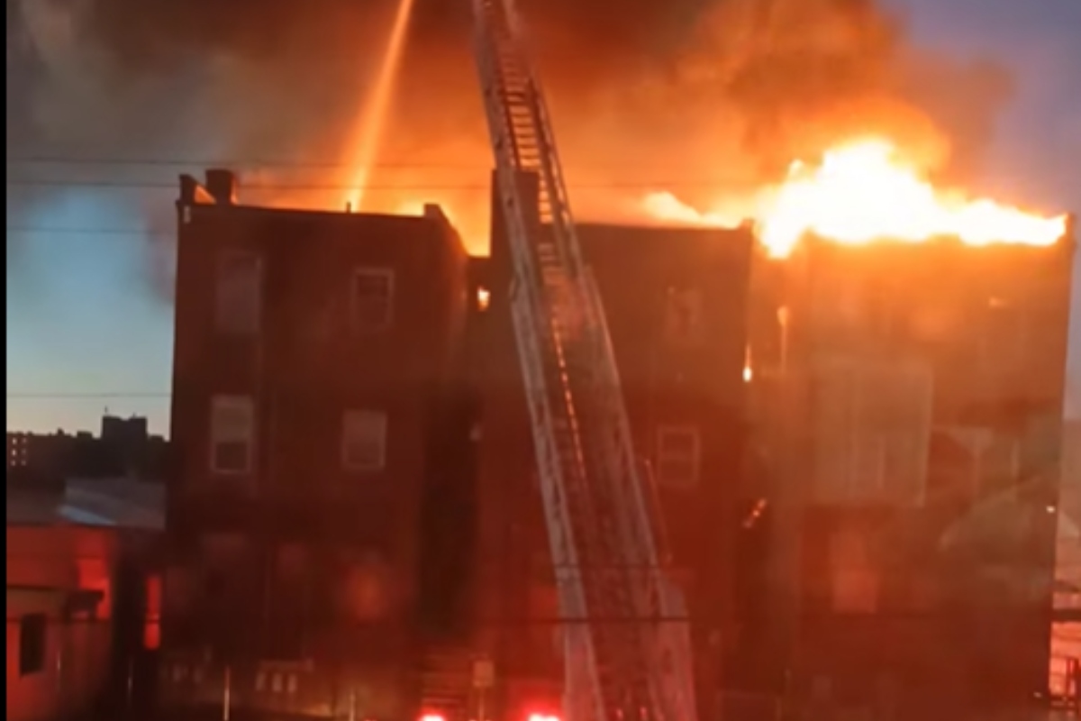 A screenshot of part of a Facebook video from the scene of a fire to a historic building in Jacksonville.