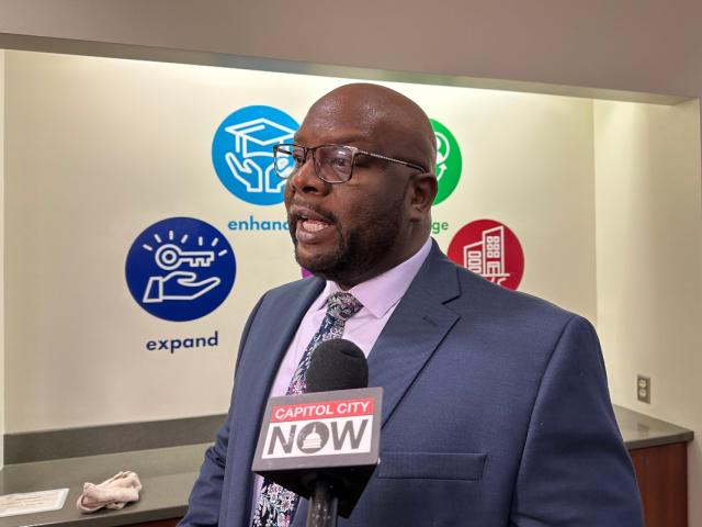 Terrence Jordan, selected as the next Superintendent of District 186 pending board approval, speaks to reporters Friday afternoon.