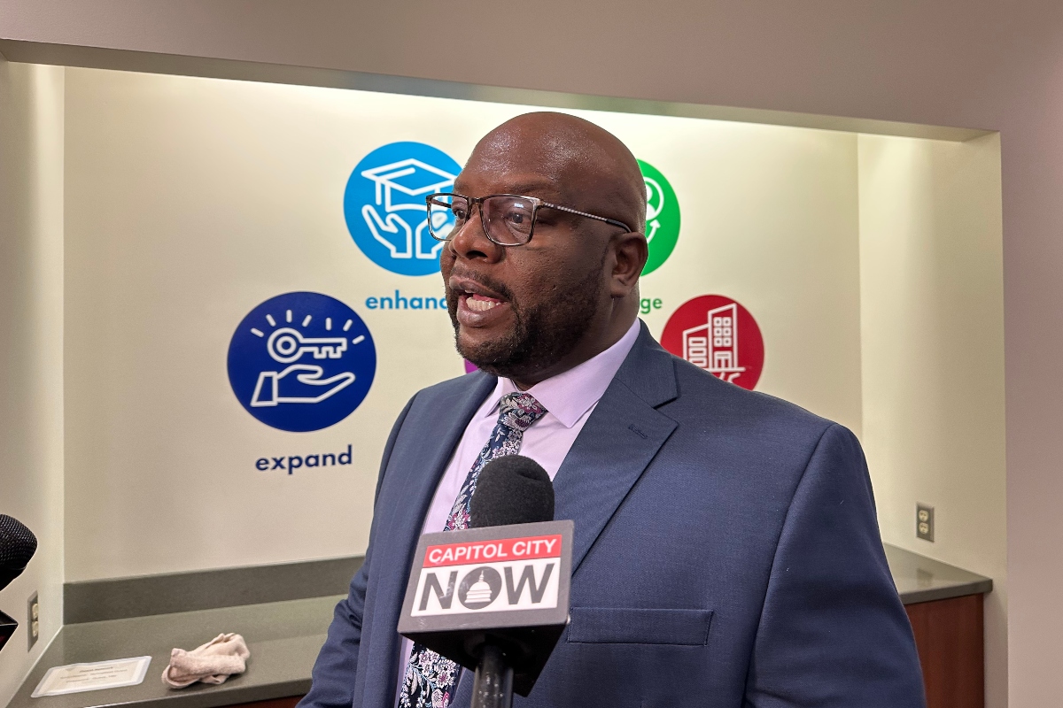 Terrence Jordan, selected as the next Superintendent of District 186 pending board approval, speaks to reporters Friday afternoon.
