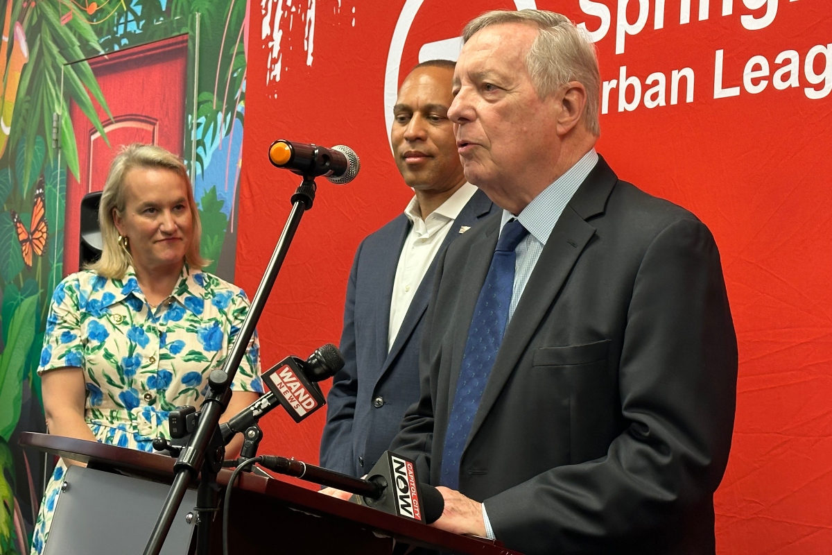 Rep. Nikki Budzinski, House Minority Leader Hakeem Jeffries, and Sen. Dick Durbin speak in 2025 at the Springfield Urban League.