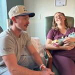 Matt, Amy, and baby Theodore Barker after being the first family to give birth in Springfield in 2026. Well, Theodore had no comment.