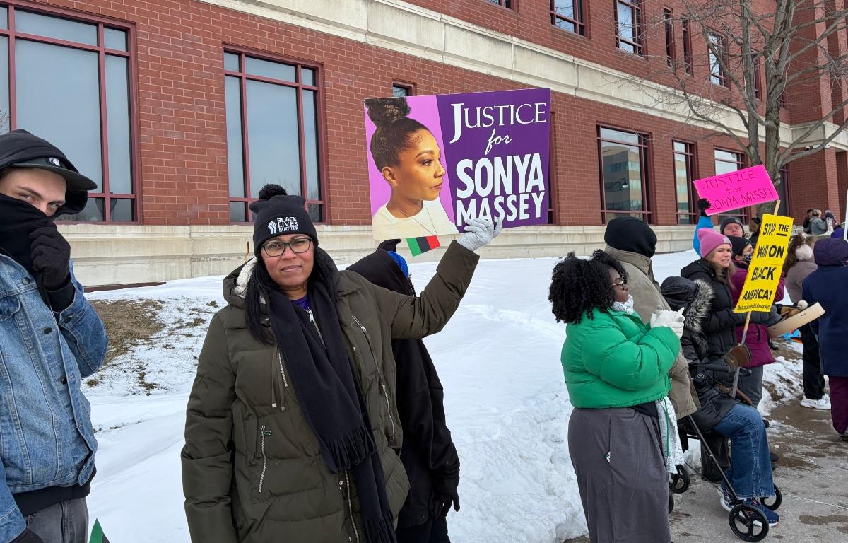 Rally-goers gather outside of the Sangamon County Complex during Thursday's sentencing hearing for Sean Grayson.