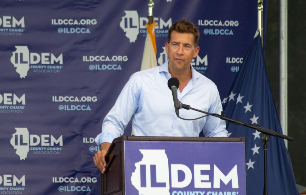 Alexi Giannoulias, now the Illinois secretary of state, speaks at a Democratic Party event in 2021. He’s being sued over a 40-year-old law governing which companies can use the word “Democrat” or “Republican” in their name. (Capitol News Illinois photo by Jerry Nowicki)