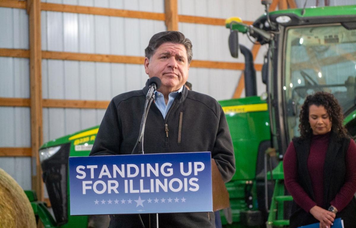 Gov. JB Pritzker listens to a question from a reporter during a news conference at a farm in Central Illinois on Oct. 29, 2025. (Capitol News Illinois photo by Jerry Nowicki)