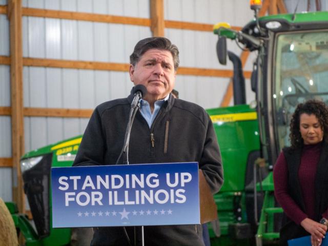 Gov. JB Pritzker listens to a question from a reporter during a news conference at a farm in Central Illinois on Oct. 29, 2025. (Capitol News Illinois photo by Jerry Nowicki)