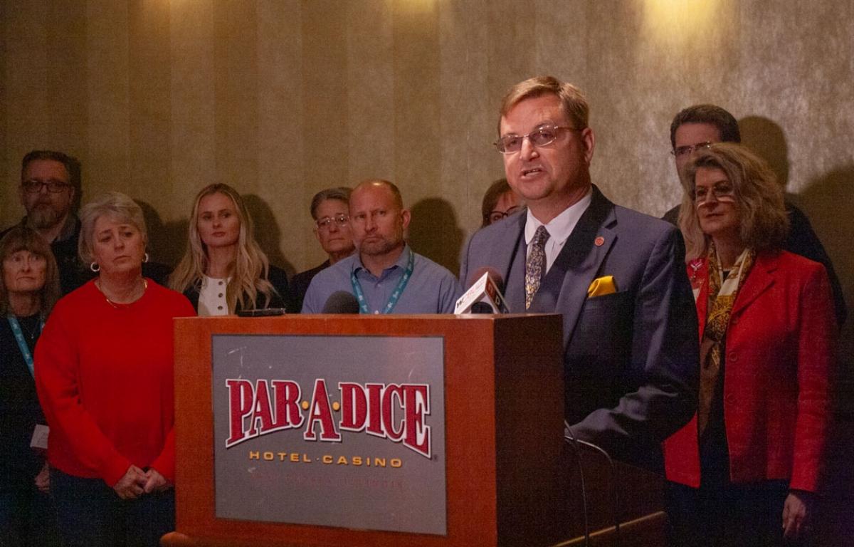 Tazewell County Clerk John Ackerman speaks at a news conference in Peoria. Ackerman traveled to Washington, D.C., with three other clerks in September 2025 to meet with federal lawmakers to advocate against the USPS changes. (Capitol News Illinois photo by Jenna Schweikert)