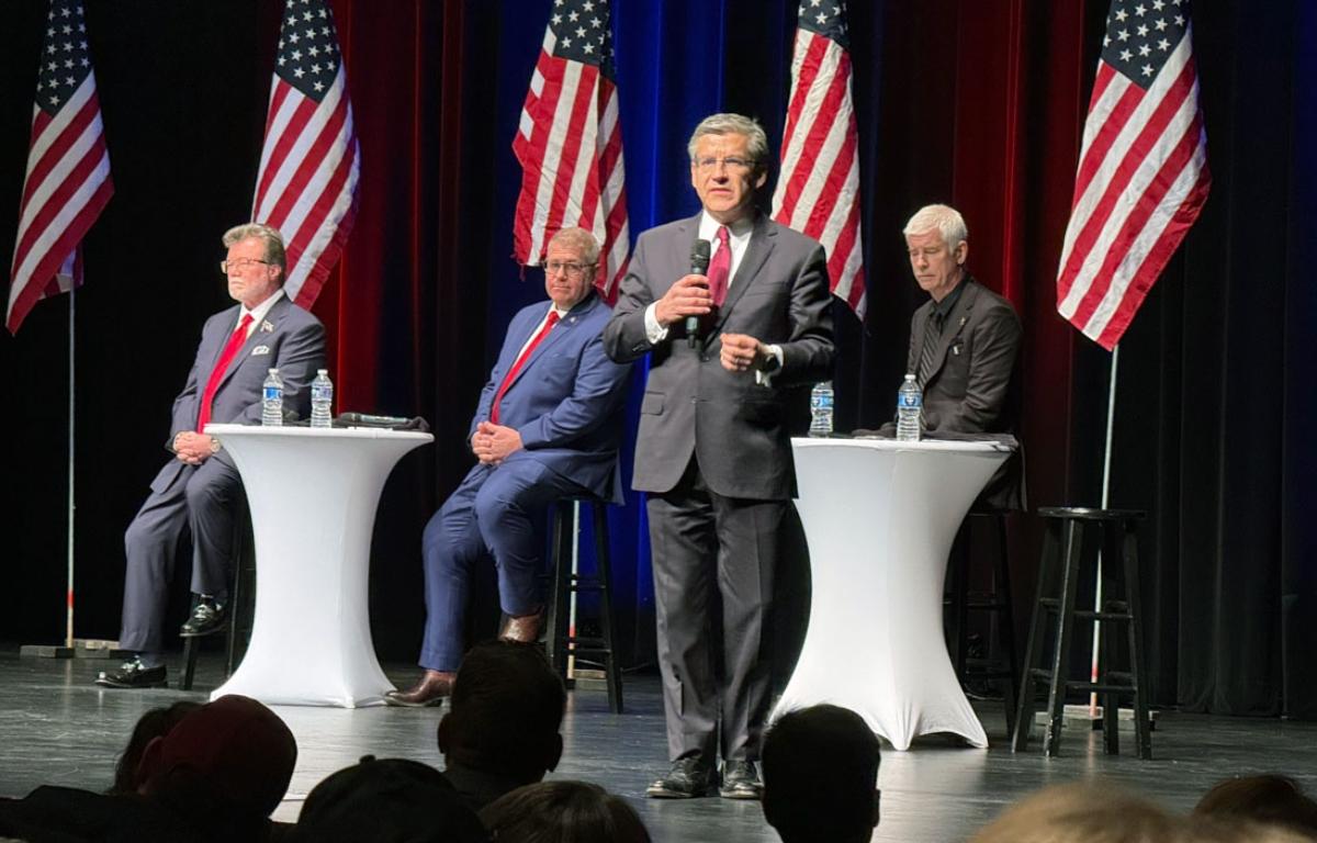 Ted Dabrowski pitches his candidacy for governor as his primary opponents – video gambling mogul Rick Heidner, former state Sen. Darren Bailey and DuPage County Sheriff James Mendrick – listen during a forum sponsored by the Tazewell County Republican Party on Jan. 15, 2026. (Capitol News Illinois photo by Brenden Moore)