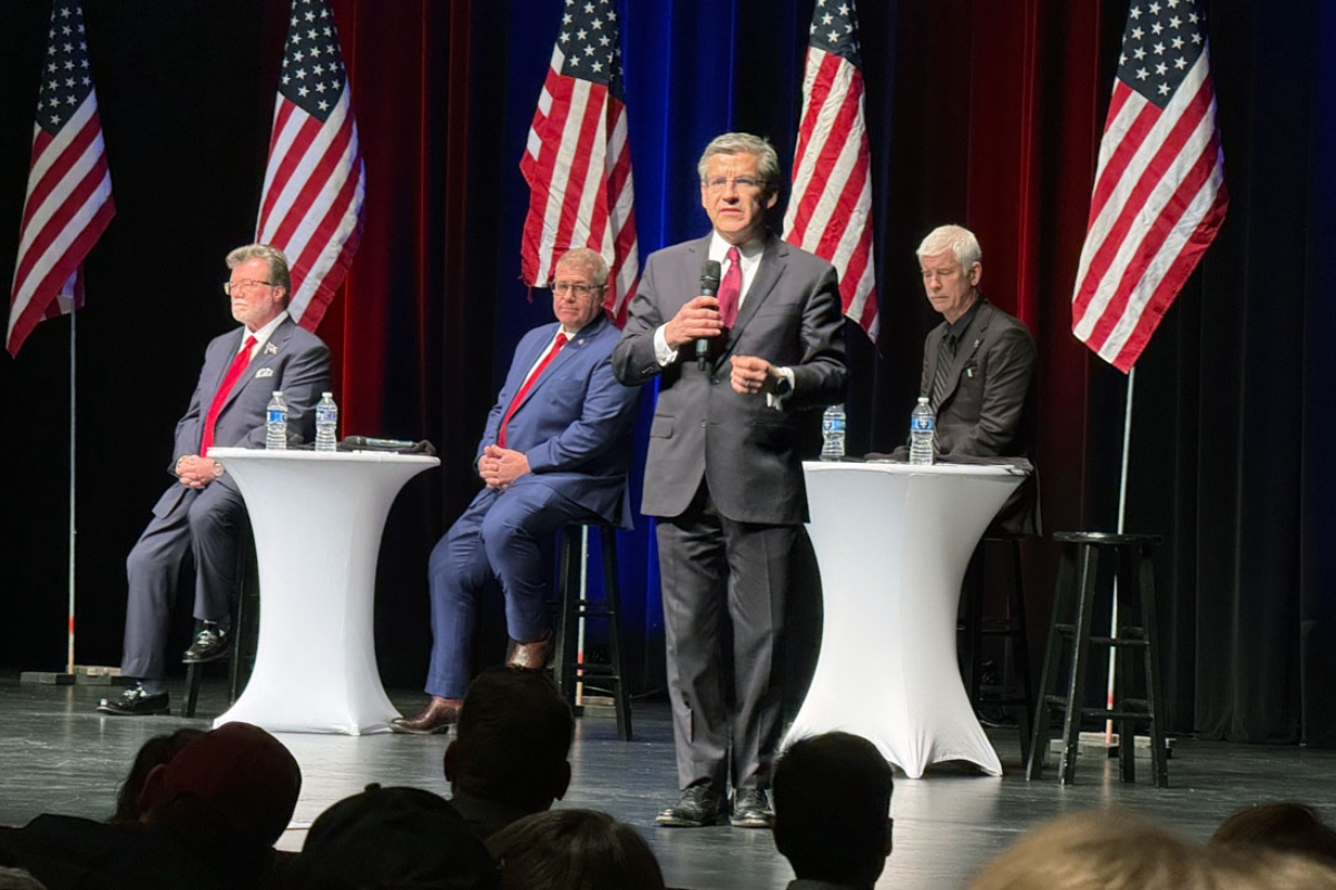 Ted Dabrowski pitches his candidacy for governor as his primary opponents – video gambling mogul Rick Heidner, former state Sen. Darren Bailey and DuPage County Sheriff James Mendrick – listen during a forum sponsored by the Tazewell County Republican Party on Jan. 15, 2026. (Capitol News Illinois photo by Brenden Moore)