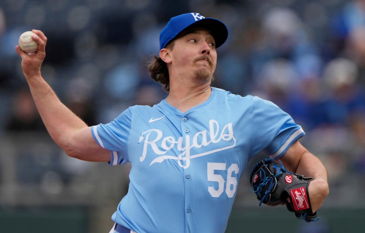 FILE - Kansas City Royals relief pitcher Hunter Harvey throws during the ninth inning of a baseball game against the Cleveland Guardians, March 30, 2025, in Kansas City, Mo. (AP Photo/Charlie Riedel, File)