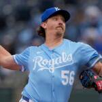 FILE - Kansas City Royals relief pitcher Hunter Harvey throws during the ninth inning of a baseball game against the Cleveland Guardians, March 30, 2025, in Kansas City, Mo. (AP Photo/Charlie Riedel, File)