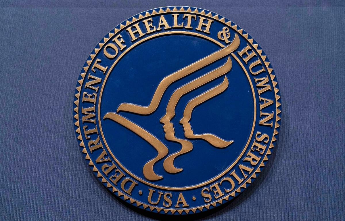 FILE = The Health and Human Services seal is seen before the news conference of Secretary Robert F. Kennedy Jr. at the Hubert Humphrey Building Auditorium in Washington, Wednesday, April 16, 2025. (AP Photo/Jose Luis Magana, File)