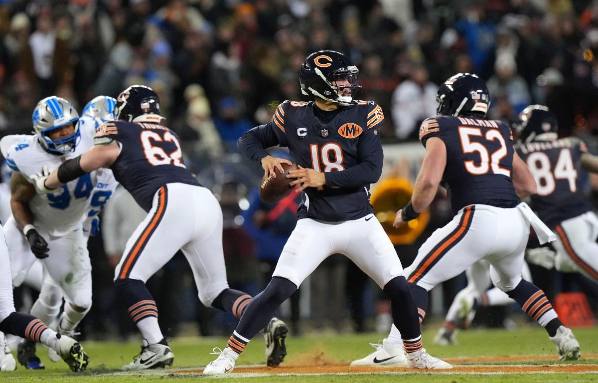 Chicago Bears quarterback Caleb Williams (18) throws a pass during the second half of an NFL football game against the Detroit Lions, Sunday, Jan. 4, 2026, in Chicago. (AP Photo/Nam Y. Huh)