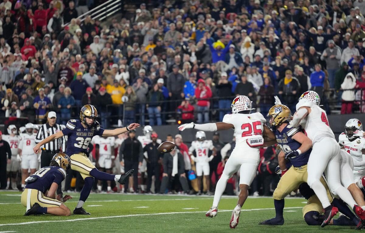 Montana State place-kicker Myles Sansted (39) kicks a point after try to win the FCS Championship NCAA college football game against Illinois State in overtime Monday, Jan. 5, 2026, in Nashville, Tenn. (AP Photo/George Walker IV)