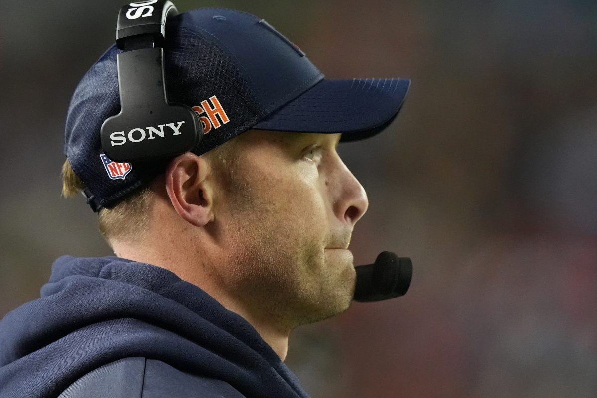 Chicago Bears head coach Ben Johnson watches during the first half of an NFL wild-card playoff football game against the Green Bay Packers Saturday, Jan. 10, 2026, in Chicago. (AP Photo/Nam Huh)