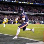 Chicago Bears' DJ Moore catches a touchdown pass during the second half of an NFL wild-card playoff football game against the Green Bay Packers Saturday, Jan. 10, 2026, in Chicago. (AP Photo/Nam Huh)