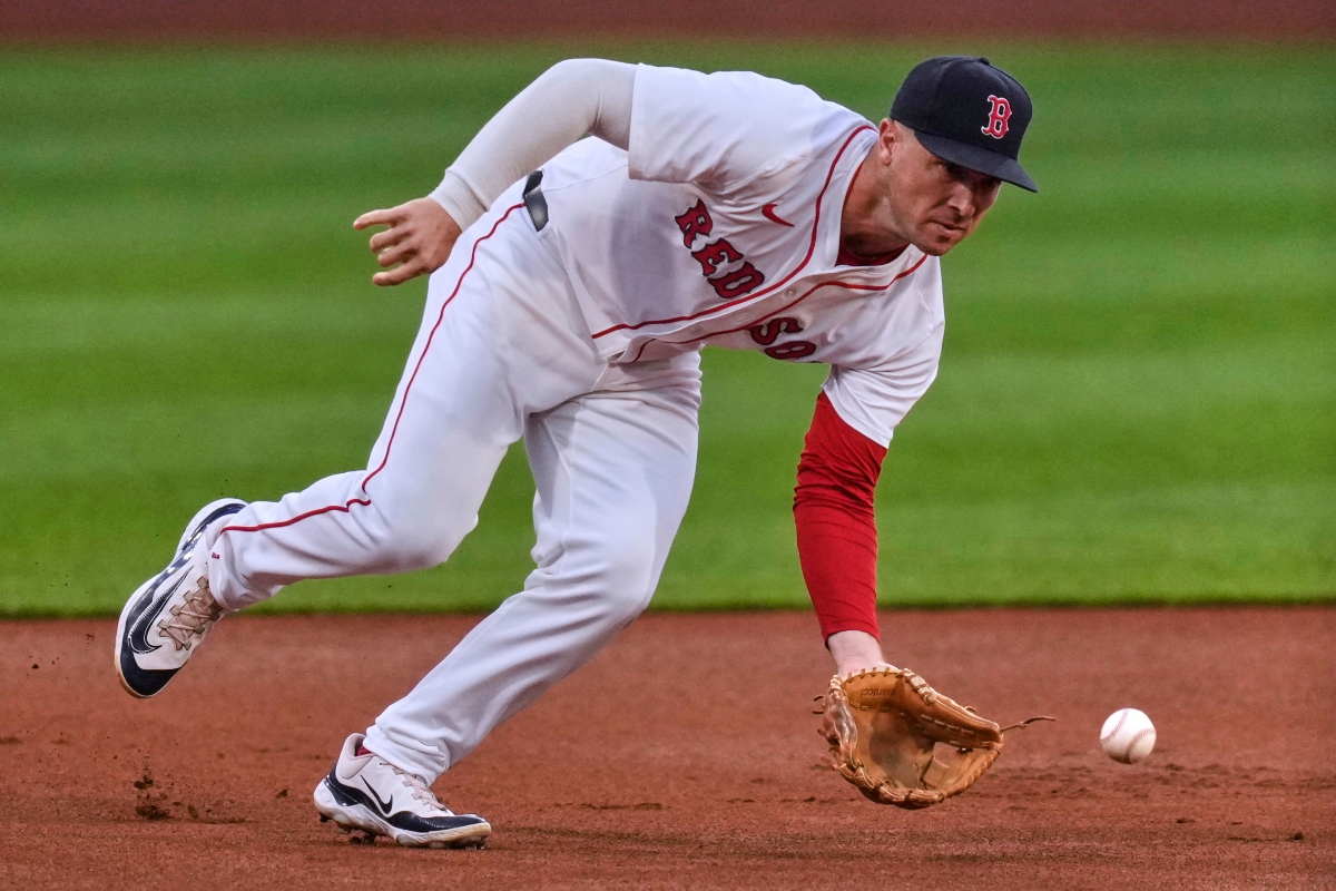 FILE - Boston Red Sox third baseman Alex Bregman fields a groundout hit by Baltimore Orioles' Jordan Westburg during the first inning of a baseball game at Fenway Park, on Aug. 18, 2025, in Boston. (AP Photo/Charles Krupa, File)