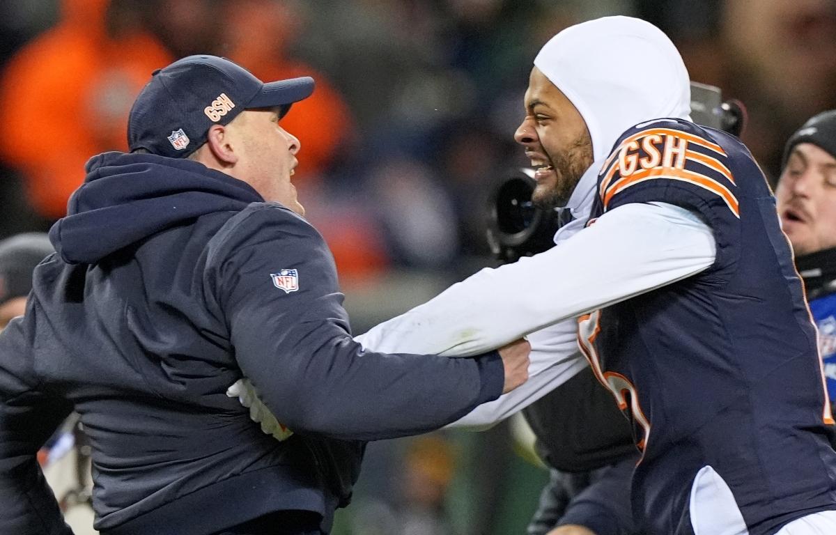 Chicago Bears head coach Ben Johnson celebrates with Rome Odunze after an NFL wild-card playoff football game against the Green Bay Packers Saturday, Jan. 10, 2026, in Chicago. (AP Photo/Nam Huh)