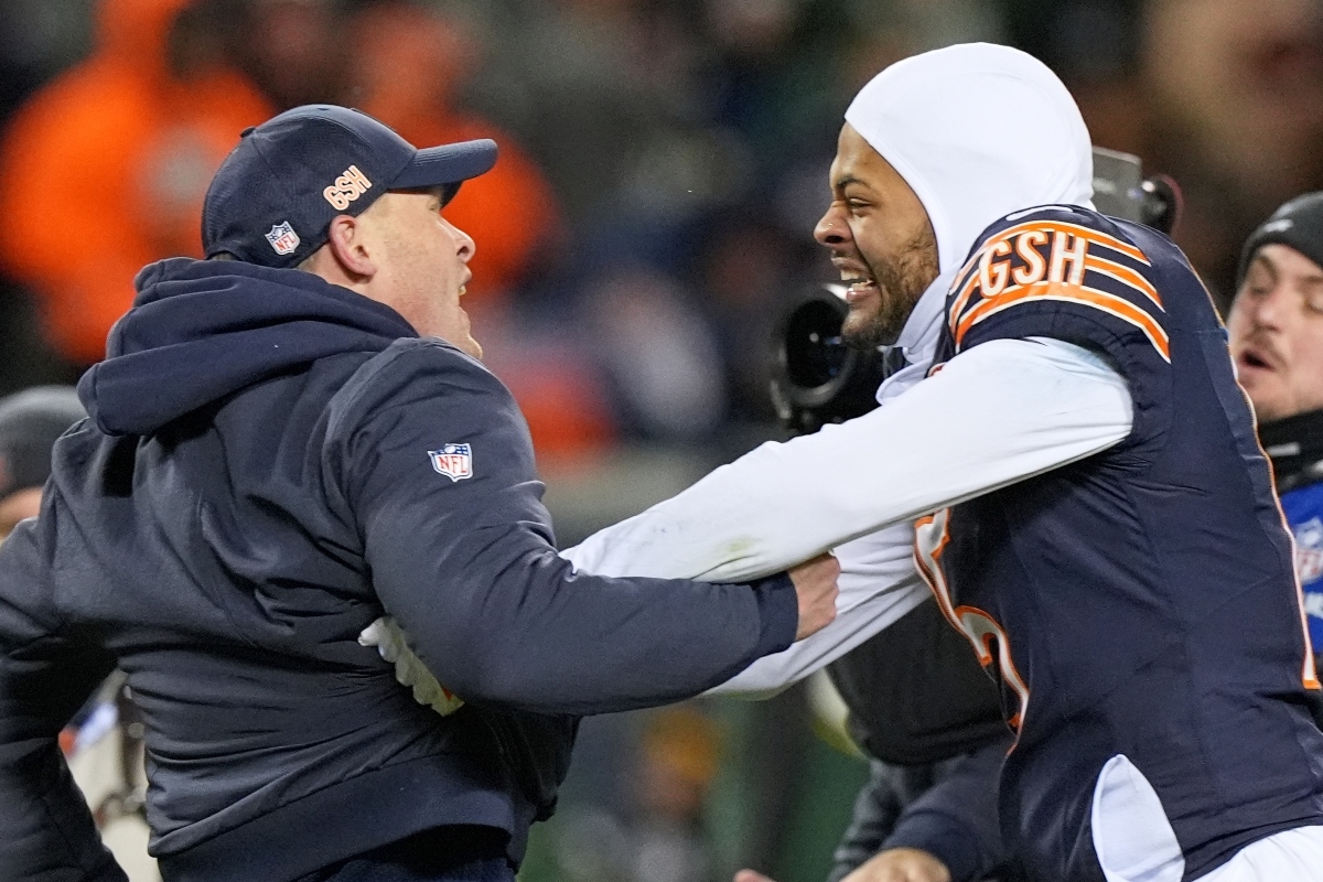 Chicago Bears head coach Ben Johnson celebrates with Rome Odunze after an NFL wild-card playoff football game against the Green Bay Packers Saturday, Jan. 10, 2026, in Chicago. (AP Photo/Nam Huh)